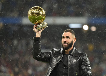 2022 winner Karim Benzema of Real Madrid holds the Ballon d'Or award
